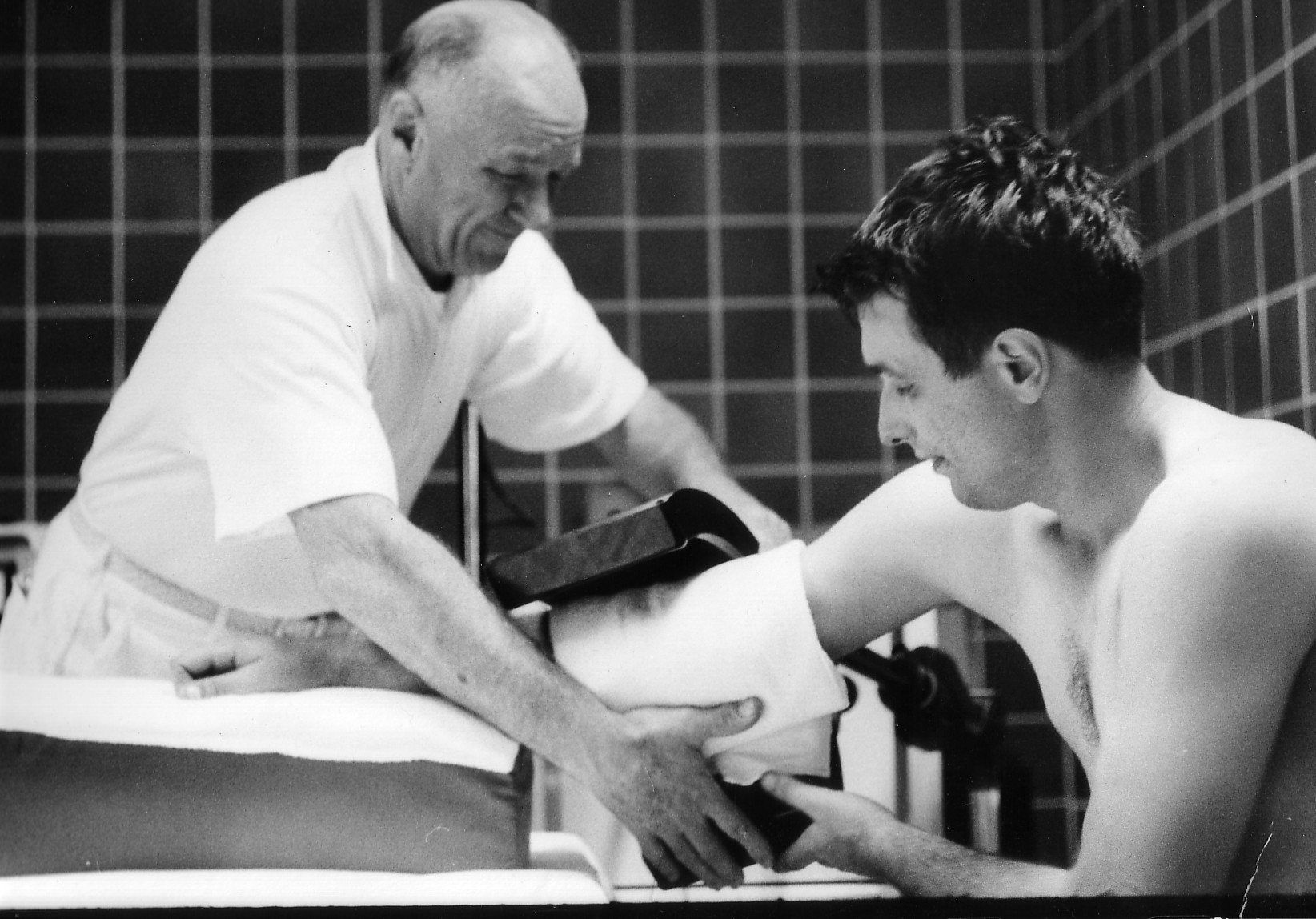 Dad getting his some treatment after a game in 1964